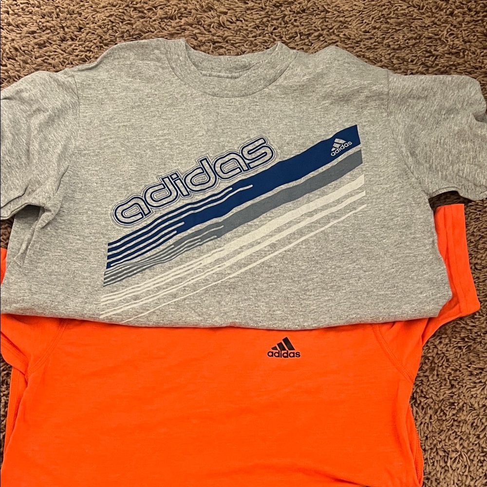 One Adidas Kids Gray Tee and one Orange Tee